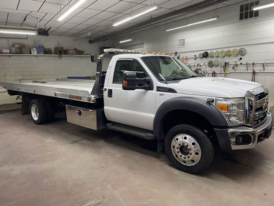 Zip's Used Truck Marketplace | 2014 Ford F550 19.5ft Aluminum Jerr-Dan